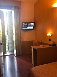 TV a/nebo společenská místnost v ubytování Hotel Aspromonte