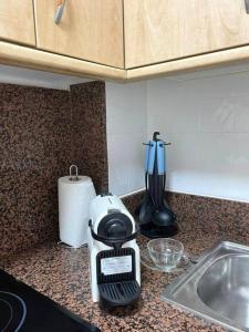 Kuchnia lub aneks kuchenny w obiekcie Apartamento céntrico y en primera línea de playa