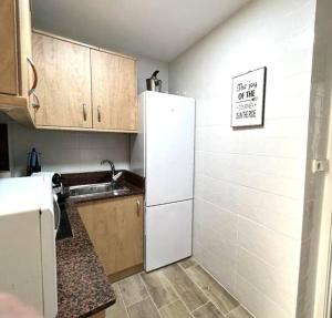 Kuchnia lub aneks kuchenny w obiekcie Apartamento céntrico y en primera línea de playa