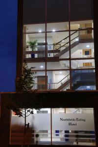 a building with a sign in front of it at Best Western Northfields Ealing Hotel in London