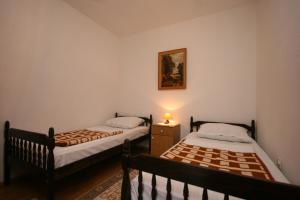 Postel nebo postele na pokoji v ubytování Apartments with a parking space Mandre, Pag - 6517