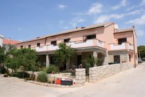 Fotografie z fotogalerie ubytování Apartments by the sea Mandre, Pag - 6457 v destinaci Kolan