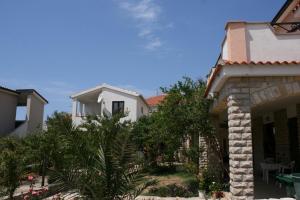 Fotografie z fotogalerie ubytování Apartments by the sea Mandre, Pag - 6457 v destinaci Kolan