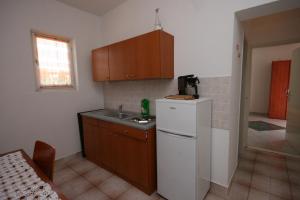 Fotografie z fotogalerie ubytování Apartments by the sea Mandre, Pag - 6457 v destinaci Kolan