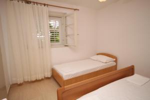 Fotografia z galérie ubytovania Apartment Makarska 6844c v destinácii Makarska