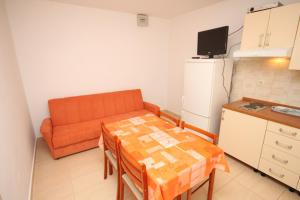 Fotografia z galérie ubytovania Apartment Makarska 6844c v destinácii Makarska