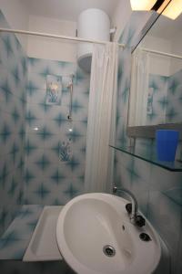 Koupelna v ubytování Apartments by the sea Podgora, Makarska - 6683