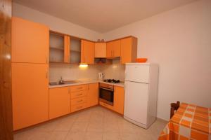 Kuchyň nebo kuchyňský kout v ubytování Apartments by the sea Podgora, Makarska - 6683