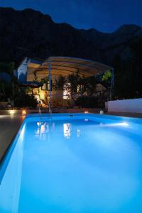 Fotografia z galérie ubytovania Family friendly house with a swimming pool Kotisina, Makarska - 6809 v destinácii Makarska