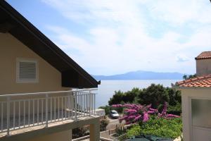 a balcony with a view of the water at Studio Podaca 6902c in Podaca