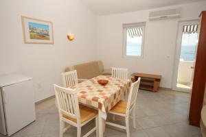 Fotografia z galérie ubytovania Apartments by the sea Metajna, Pag - 6466 v destinácii Zubovići