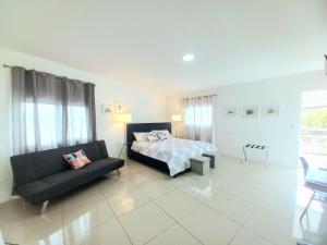 Ένα ή περισσότερα κρεβάτια σε δωμάτιο στο W's Hostel