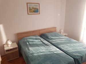 Postel nebo postele na pokoji v ubytování Apartments with a parking space Novalja, Pag - 6491