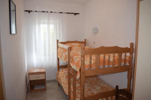 Postel nebo postele na pokoji v ubytování Apartments with a parking space Novalja, Pag - 6491