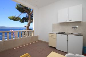 Fotografia z galérie ubytovania Apartments by the sea Brela, Makarska - 6674 v destinácii Brela