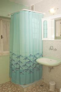 A bathroom at Apartments by the sea Okrug Gornji, Ciovo - 8330