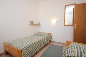 Posteľ alebo postele v izbe v ubytovaní Apartments with a parking space Kukljica, Ugljan - 8196