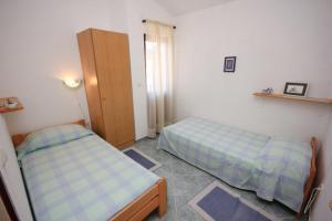 Posteľ alebo postele v izbe v ubytovaní Apartments with a parking space Kukljica, Ugljan - 8196