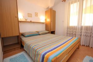 Posteľ alebo postele v izbe v ubytovaní Apartments with a parking space Kukljica, Ugljan - 8196