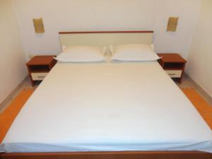 Postel nebo postele na pokoji v ubytování Apartment Zaklopatica 8347b