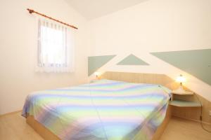 Postel nebo postele na pokoji v ubytování Apartments by the sea Zdrelac, Pasman - 8406