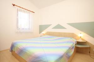 Posteľ alebo postele v izbe v ubytovaní Apartments by the sea Zdrelac, Pasman - 8406