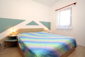 Posteľ alebo postele v izbe v ubytovaní Apartments by the sea Zdrelac, Pasman - 8406