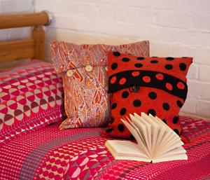 A bed or beds in a room at B&B at The Old Mill 