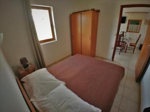 Posteľ alebo postele v izbe v ubytovaní Secluded holiday house Cove Jaz - Telascica, Dugi otok - 8176