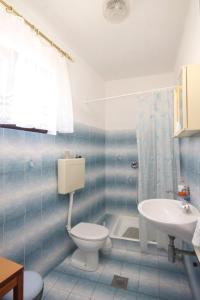 Kúpeľňa v ubytovaní Apartments by the sea Sali, Dugi otok - 8174 + 29 fotografií