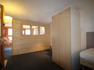 Łóżko lub łóżka w pokoju w obiekcie Duplex au calme avec balcon - 6 pers - FR-1-346-335
