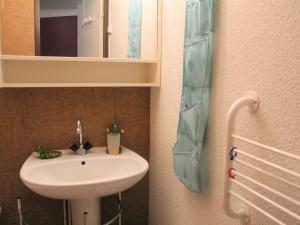 a bathroom with a sink and a mirror at Appartement Vars-Sainte-Marie, 2 pièces, 4 personnes - FR-1-330B-196 in Vars