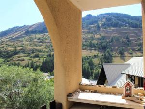 a view from the balcony of a house with a mountain at Appartement Vars-Sainte-Marie, 2 pièces, 4 personnes - FR-1-330B-196 in Vars