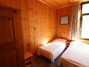 Posteľ alebo postele v izbe v ubytovaní Appartement Moderne, 14 Pers, Proche Pistes, Sauna, WIFI, Animaux Acceptés - FR-1-502-360