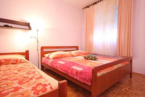 Fotografie z fotogalerie ubytování Apartments by the sea Kastel Stafilic, Kastela - 8621 v destinaci Kaštela
