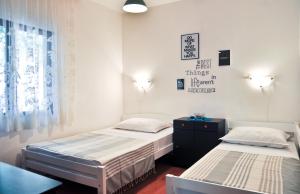 Posteľ alebo postele v izbe v ubytovaní Apartments by the sea Razanj, Rogoznica - 8365