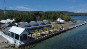 an aerial view of a resort on the water at Moyo Island Resort in Moyo Island