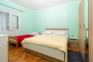 Posteľ alebo postele v izbe v ubytovaní Apartments with a parking space Kraj, Pasman - 8457