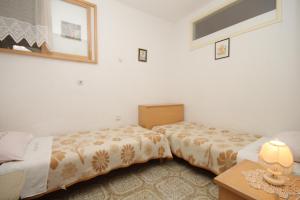 Posteľ alebo postele v izbe v ubytovaní Apartments with a parking space Kukljica, Ugljan - 8277