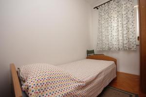 Posteľ alebo postele v izbe v ubytovaní Apartments by the sea Sali, Dugi otok - 8194