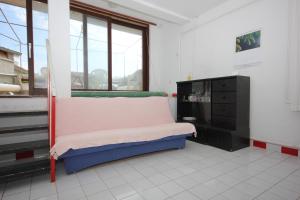 a room with a bed and a dresser and a window at Apartments by the sea Sali, Dugi otok - 8193 in Sali