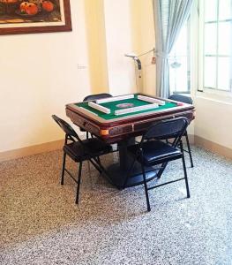 Mesa de bilhar em Ying Hsuan House