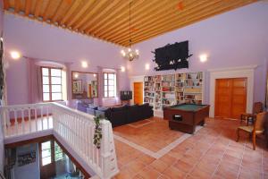 a living room with a couch and a table at Seaside house with a swimming pool Mokosica, Dubrovnik - 8583 in Mokošica
