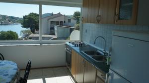 Kuchyň nebo kuchyňský kout v ubytování Apartments by the sea Luka, Dugi otok - 8182 + 15 fotografií