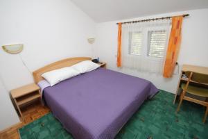 Postel nebo postele na pokoji v ubytování Apartments by the sea Kukljica, Ugljan - 8402