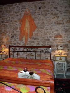 Arhontiko Kordopati Traditional Guesthouse tesisinde bir odada yatak veya yataklar