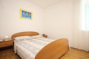 En eller flere senge i et værelse på Apartments with a parking space Susica, Ugljan - 8467