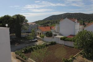 an aerial view of a town with a fence at Apartments with a parking space Tribunj, Vodice - 8369 in Tribunj