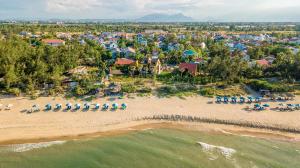 an aerial view of the beach at a resort at May Villa 6BR Beachfront An Bang Beach Hoi An by Beachside Boutique Homes in An Bàn (2)