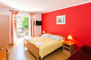 Postel nebo postele na pokoji v ubytování Apartments with a parking space Mlini, Dubrovnik - 8543
